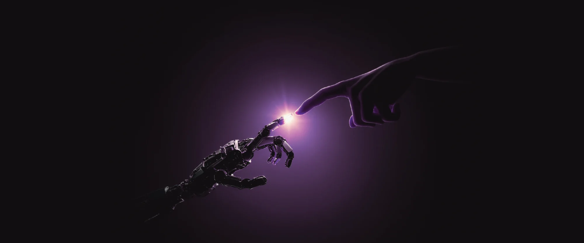 The Next Step in Evolution — a human hand reaching toward a robotic hand