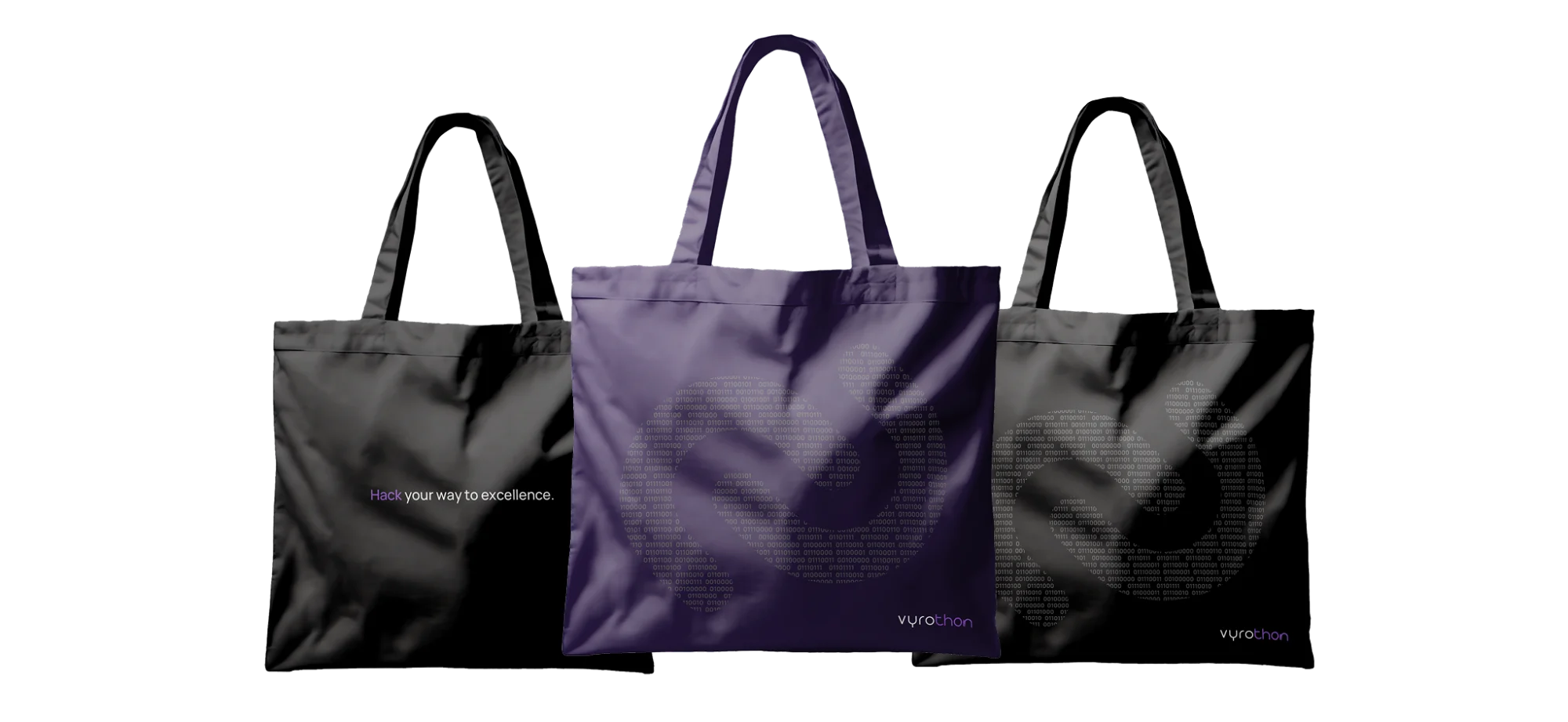 Three Vyrothon tote bags in black, purple and grey